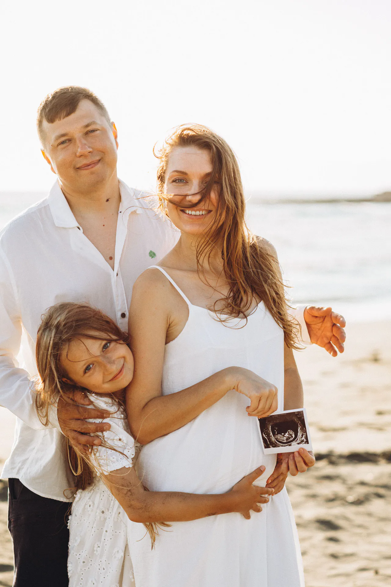 Family Memories by the Sea. Nastya, Oleg, Zlata. — photograph 2